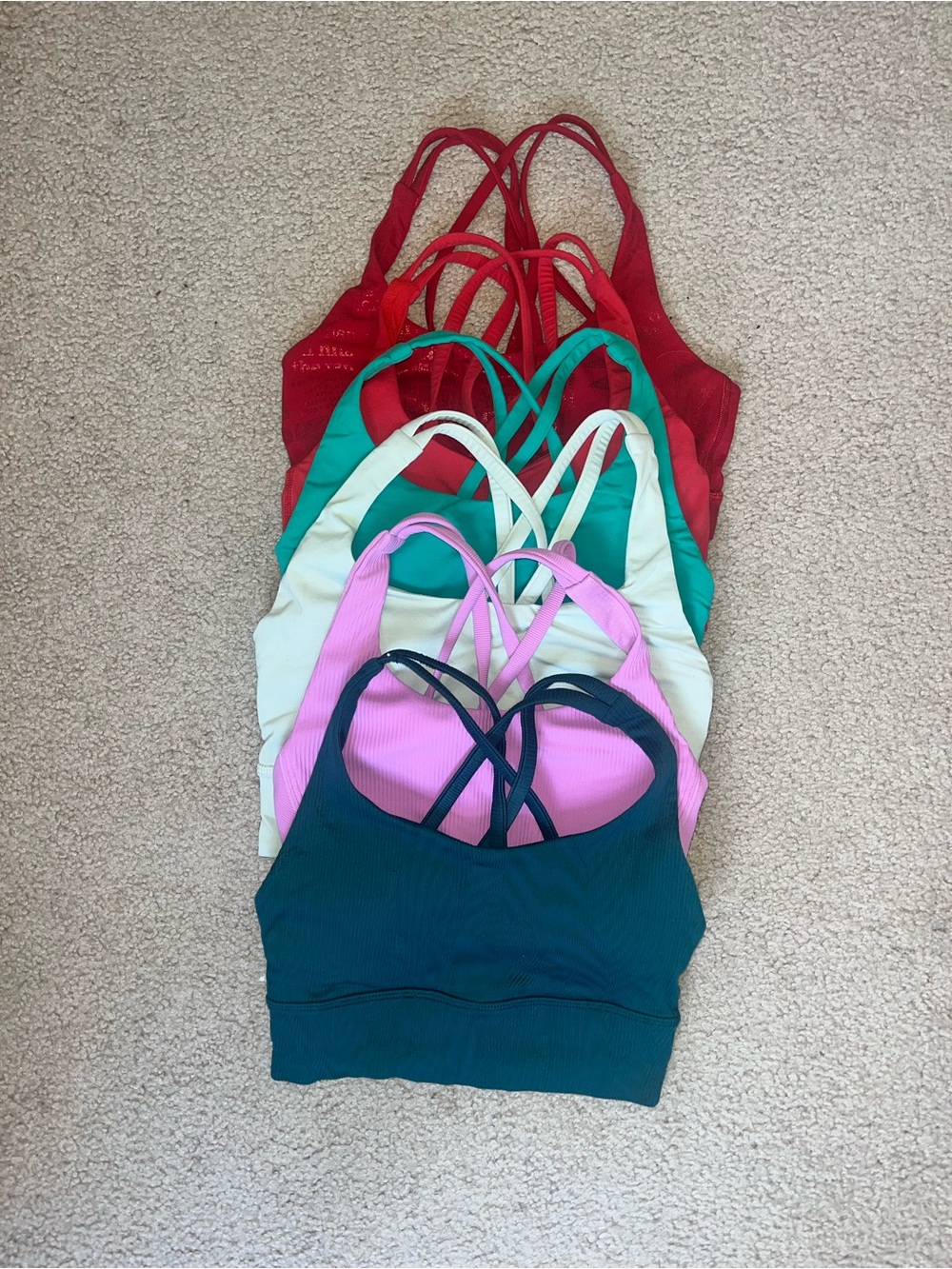 Size 4 Lululemon sports bras (six of them)